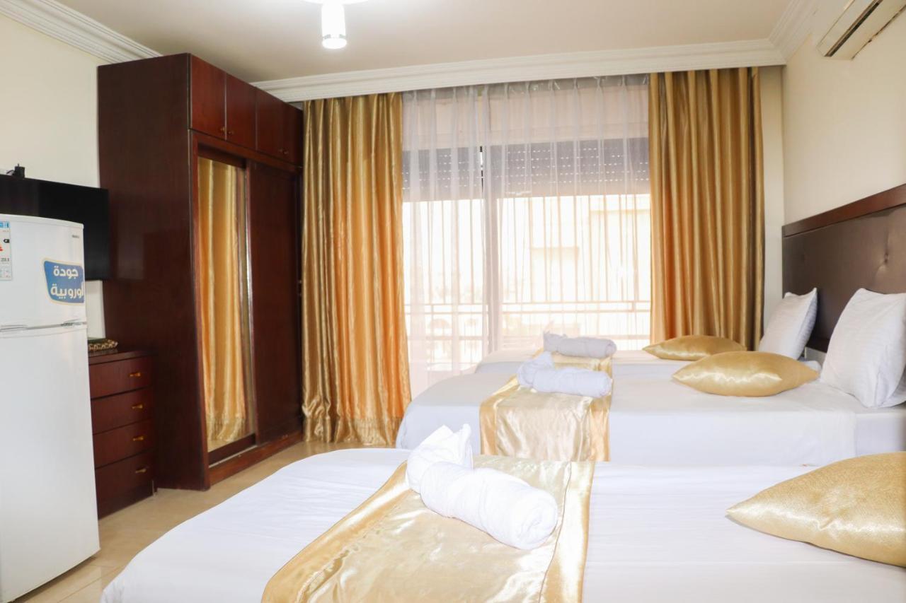 Al Jamal Suites Esterno foto